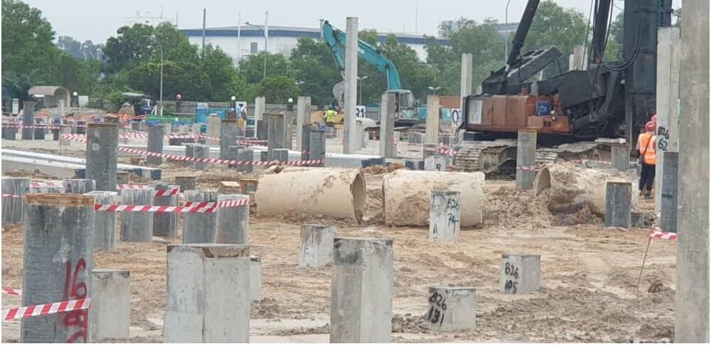 Piling and reinforced concrete works underway at an industrial site