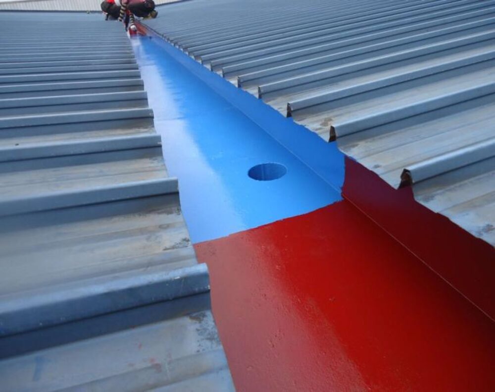 Roof GI gutter changing and PU waterproofing painting on a metal roof