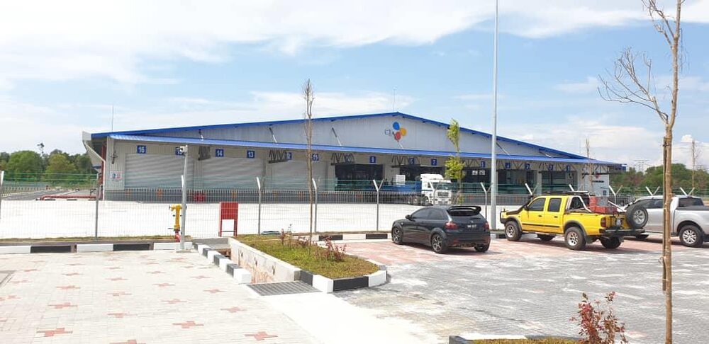 Completed warehouse exterior with roofing and cladding at CJ Bio Paka