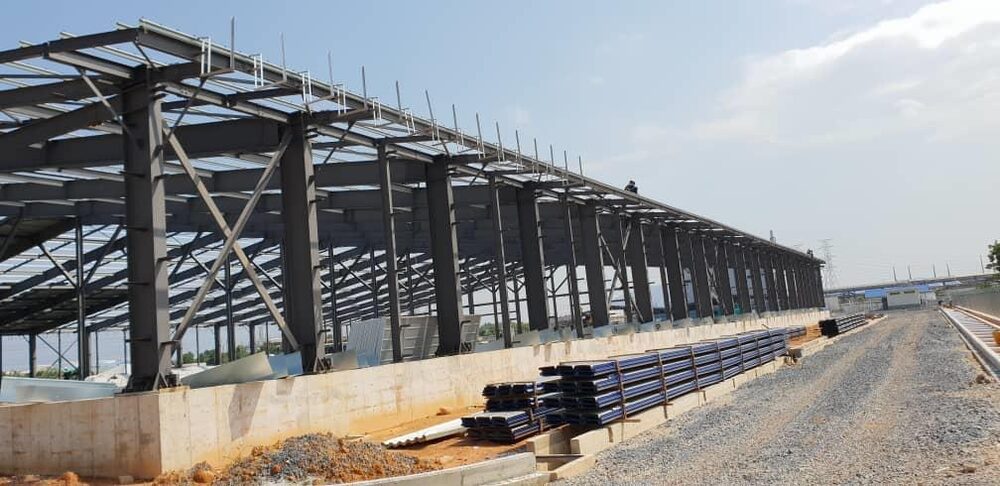 Steel warehouse frame fabrication at CJ Bio Paka